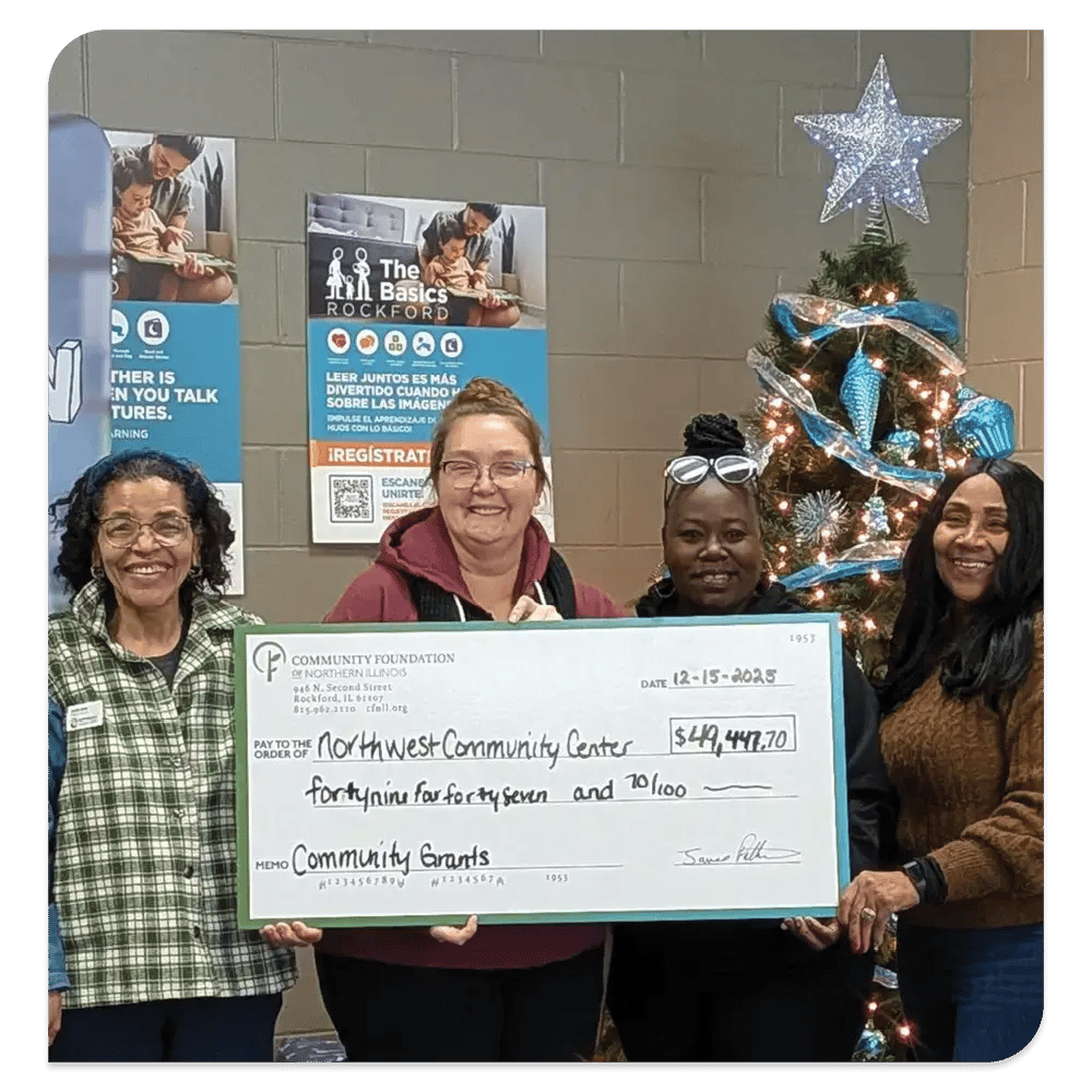 4 women accepting a CFNIL Grant