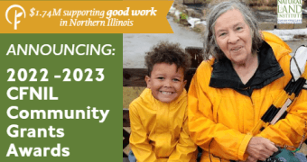 Young boy and woman in yellow coats